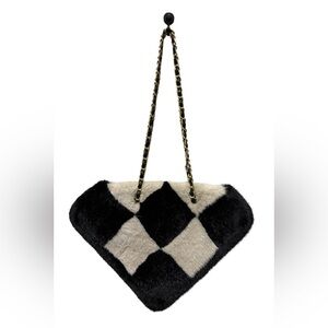 Shearling checkered tote bag with black and ivory pattern and gold chain